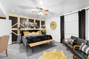 Bedroom featuring light carpet and ceiling fan