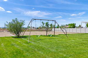 View of yard featuring a playground