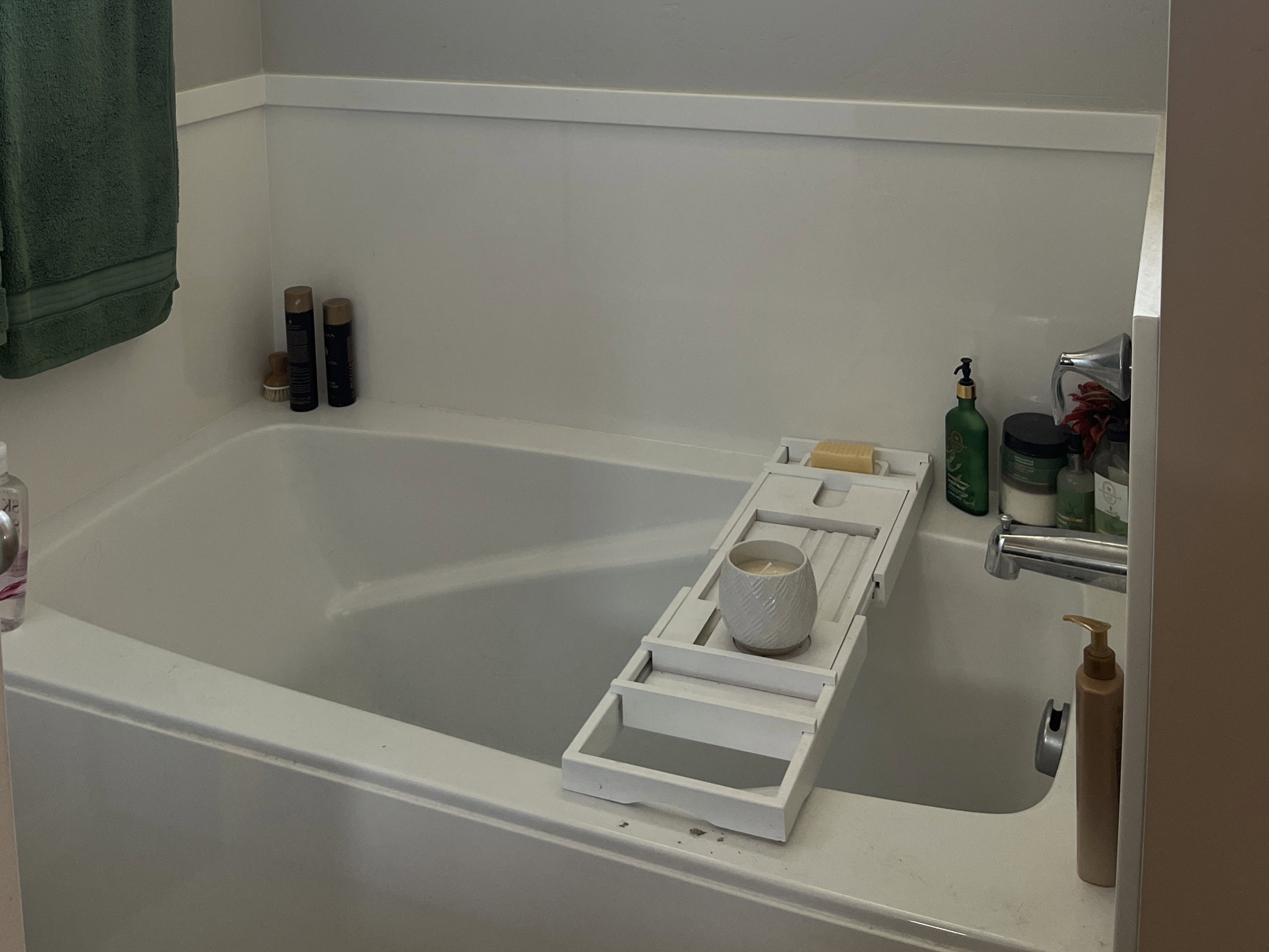 Full bathroom featuring a garden tub