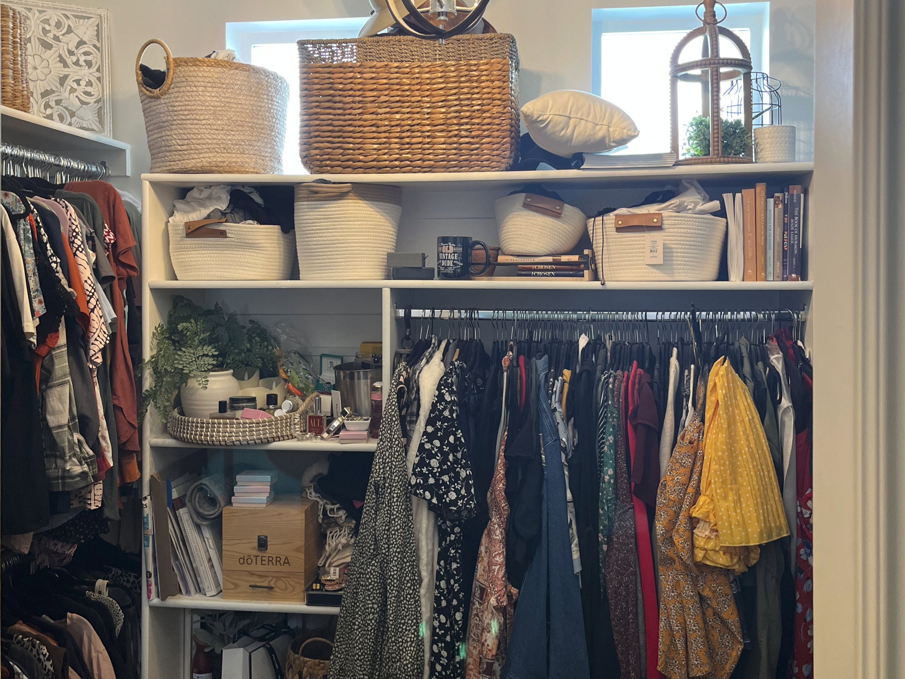 Walk in closet featuring suspended lighting