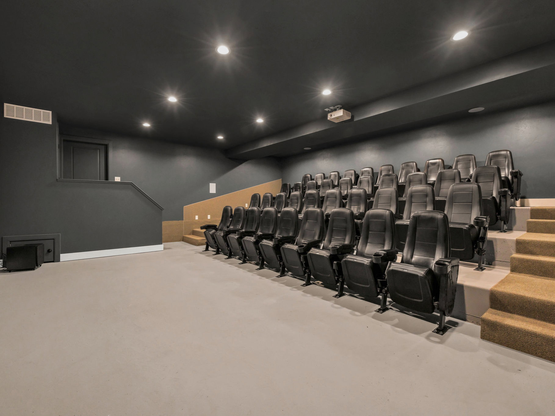 Home theater featuring recessed lighting and light carpet