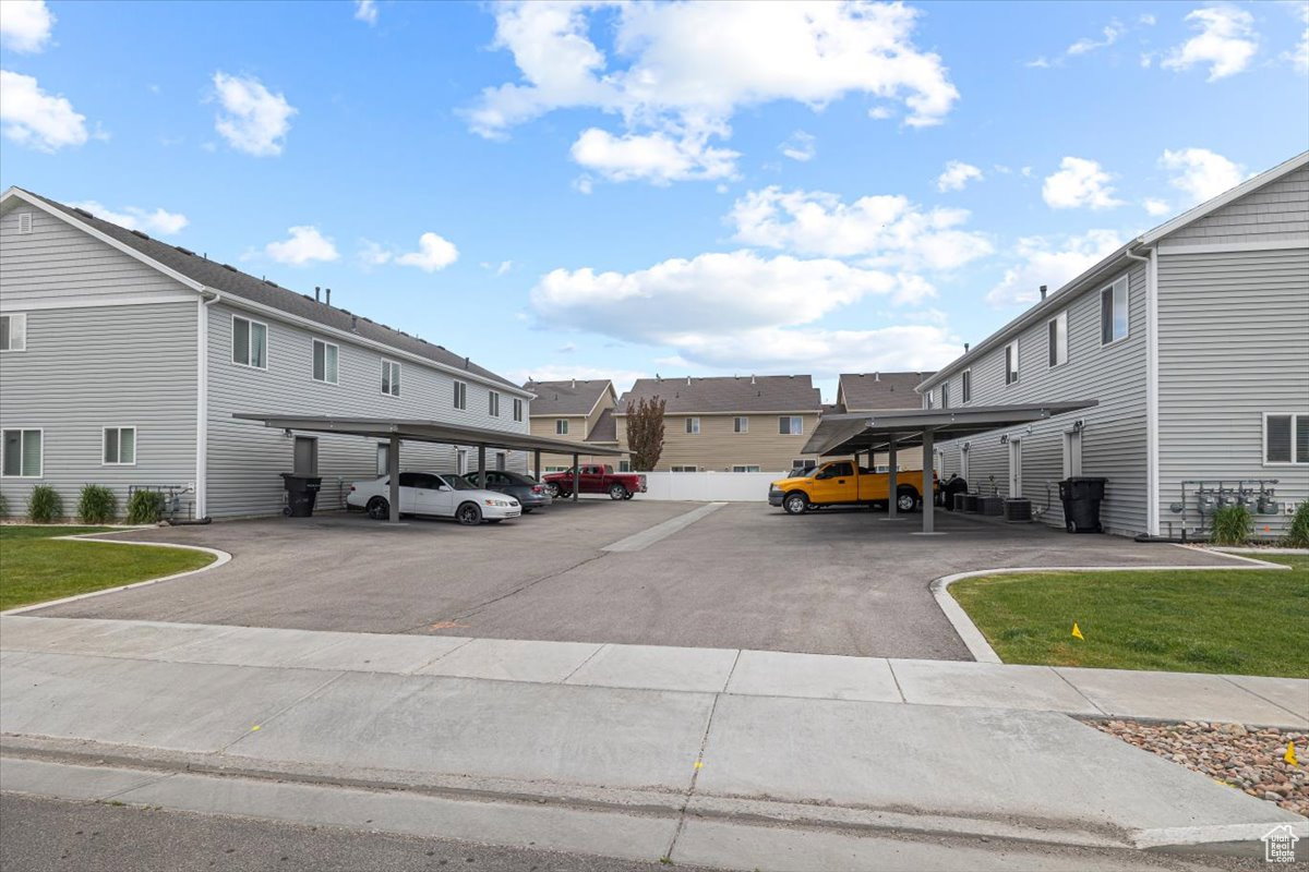 View of asphalt road with a residential view