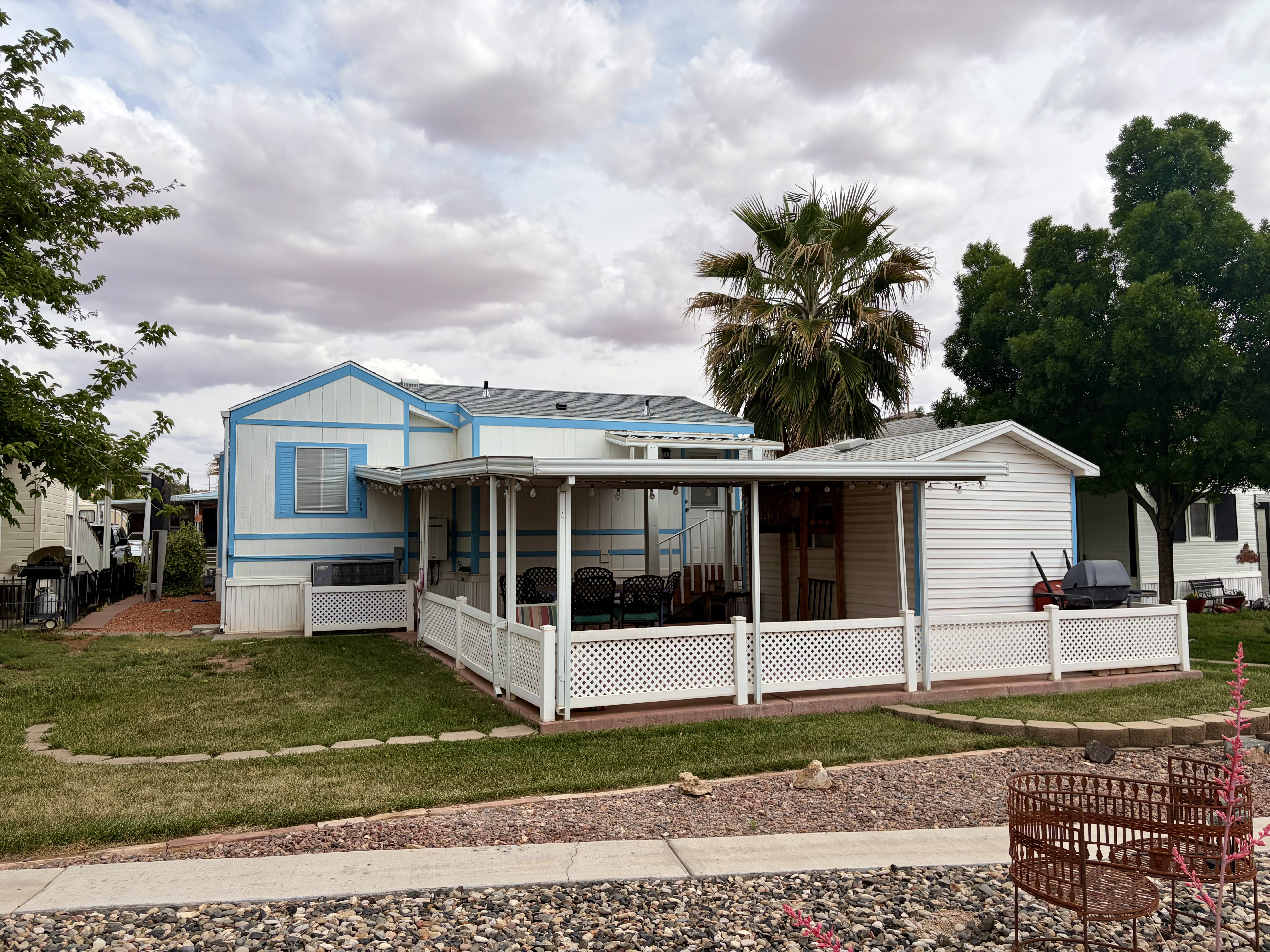 Rear view of house with a yard