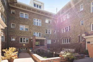 #10 unit entry way is shown in middle of photo