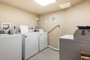 Shared laundry with washer and clothes dryer. Laundry room is found on the south side of the building