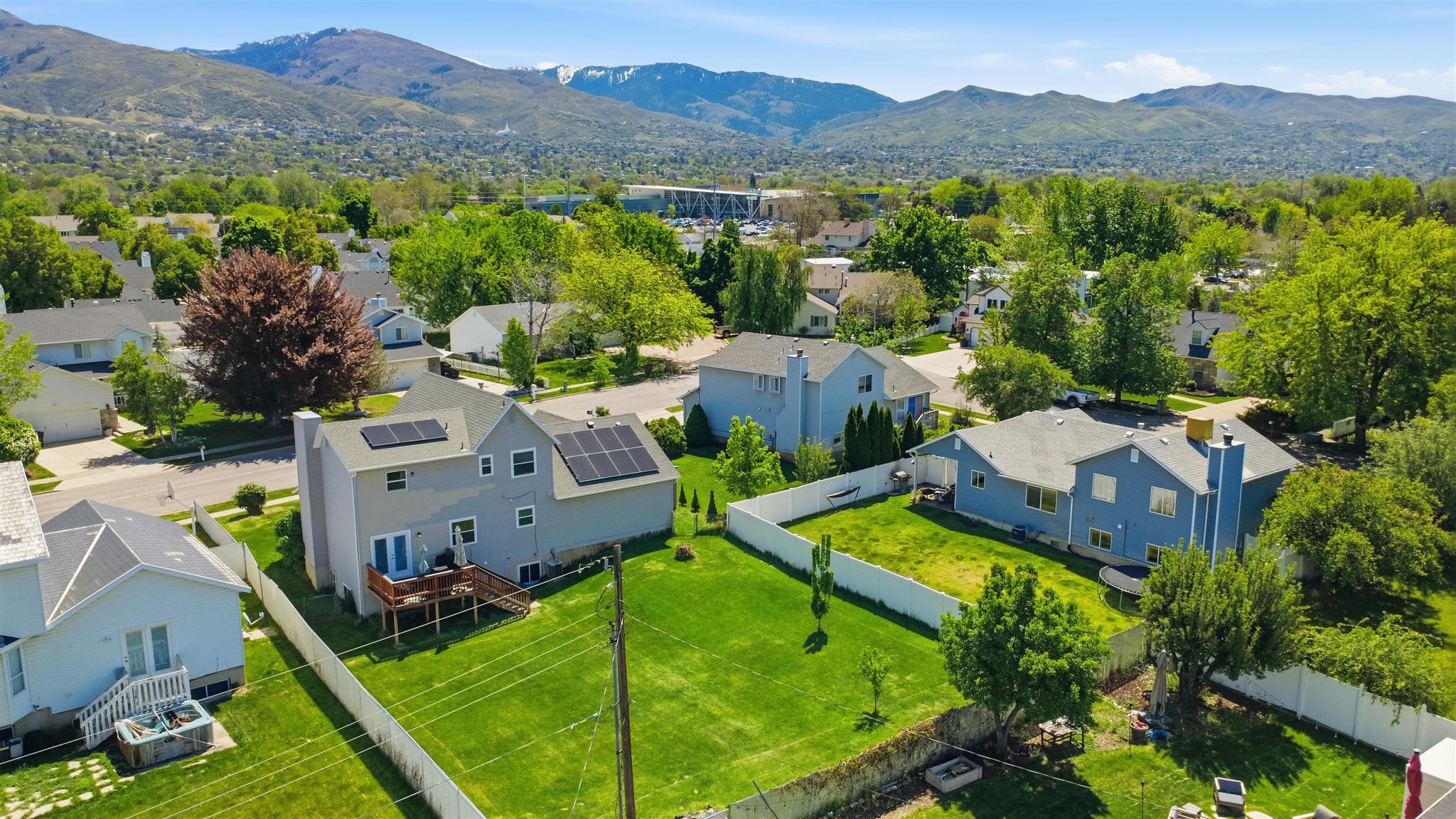 Expansive green lawns with established trees