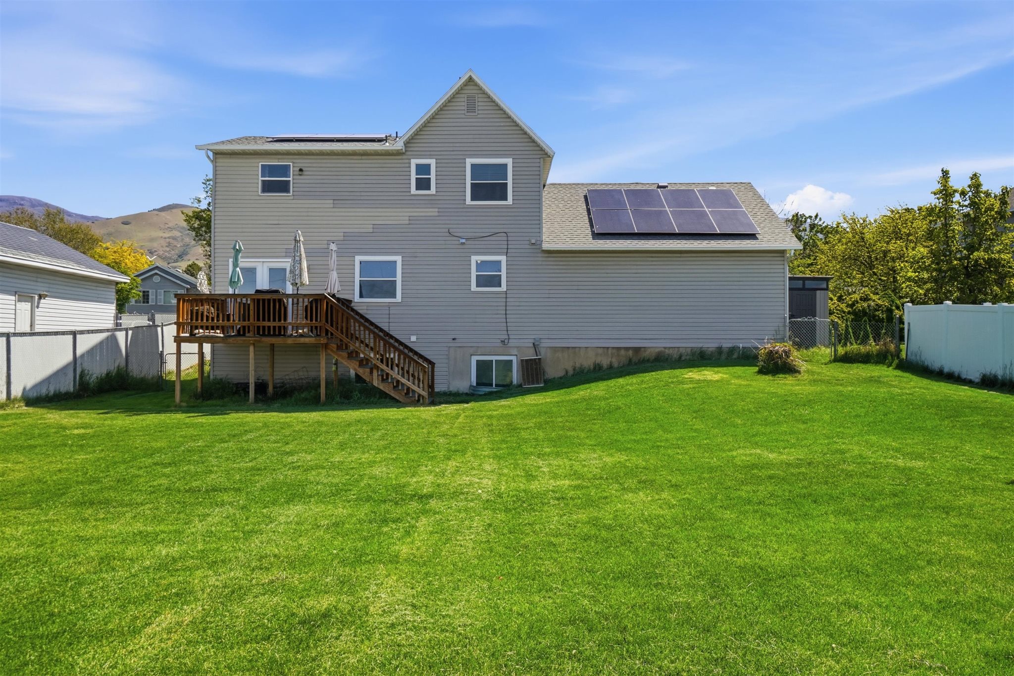 Expansive green lawn providing ample outdoor space