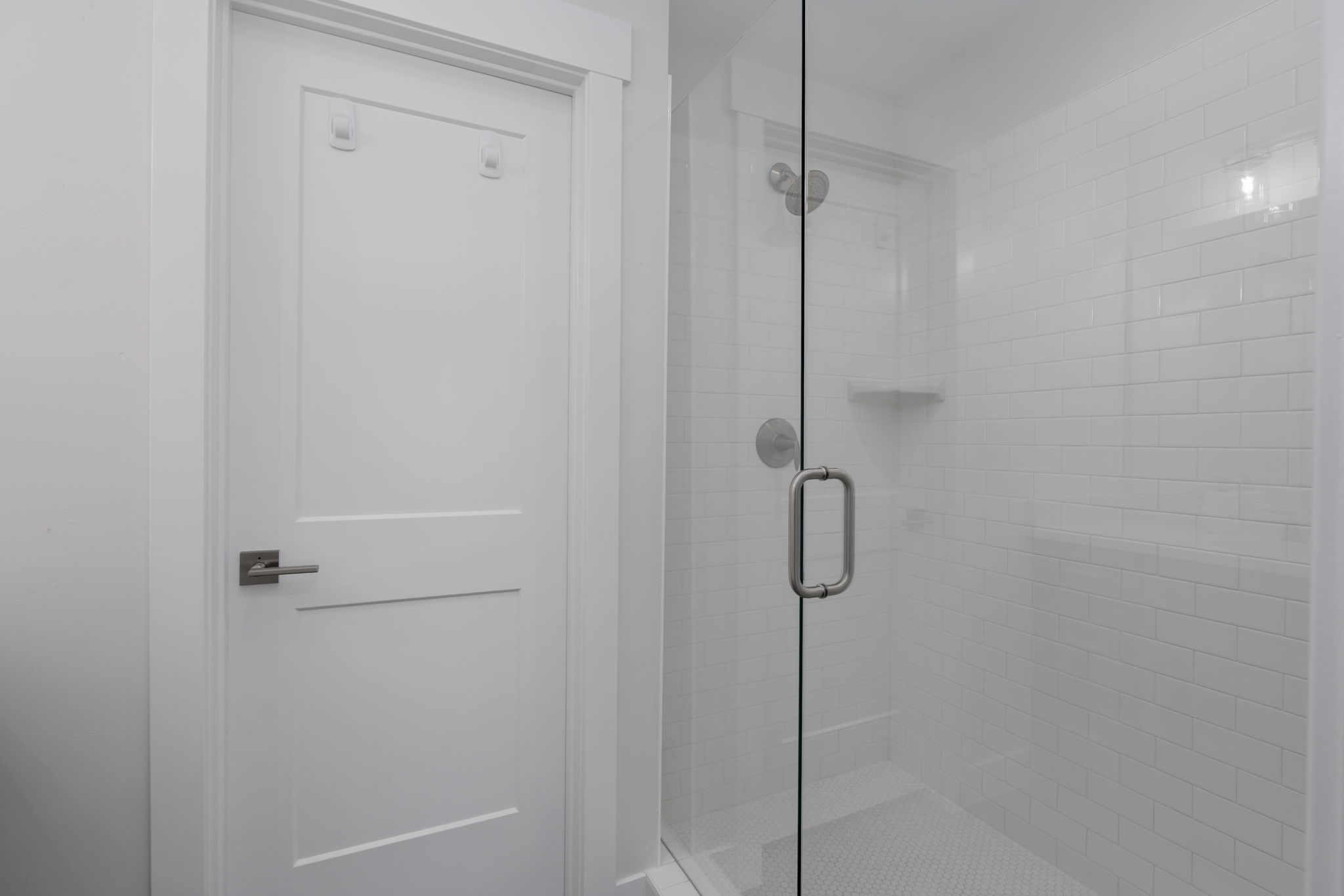 Full bathroom featuring a stall shower