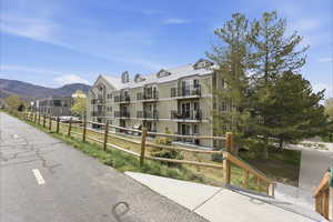 View of apartment building / complex with a mountain view