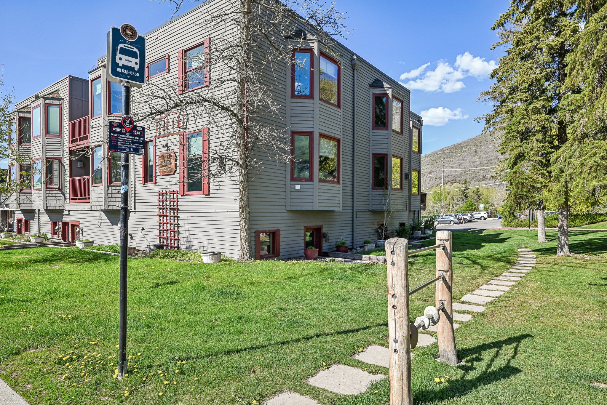 View of property exterior featuring a yard
