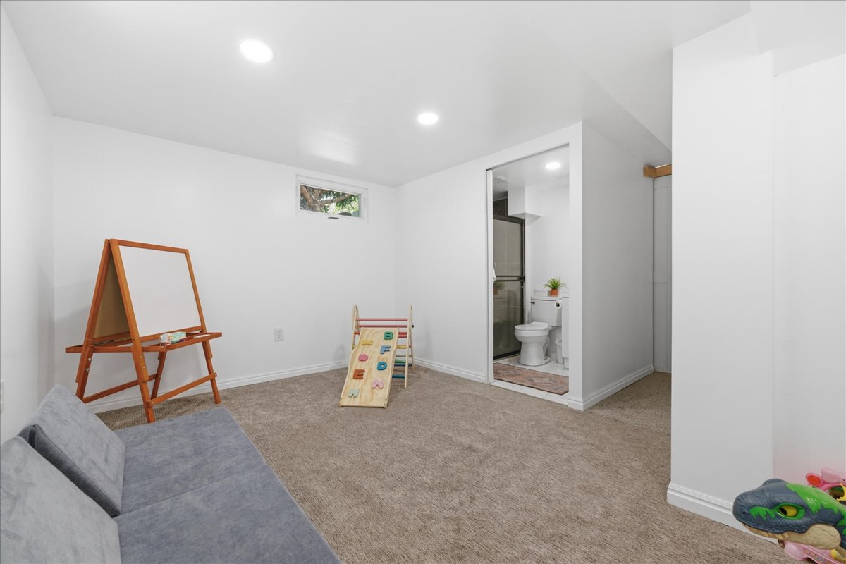 Playroom featuring carpet floors and recessed lighting