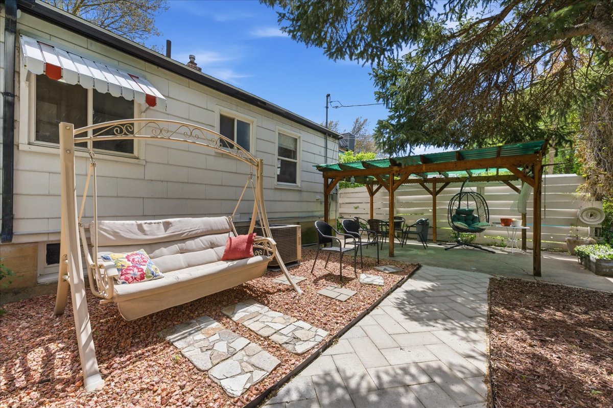 View of patio with a pergola and an outdoor living space