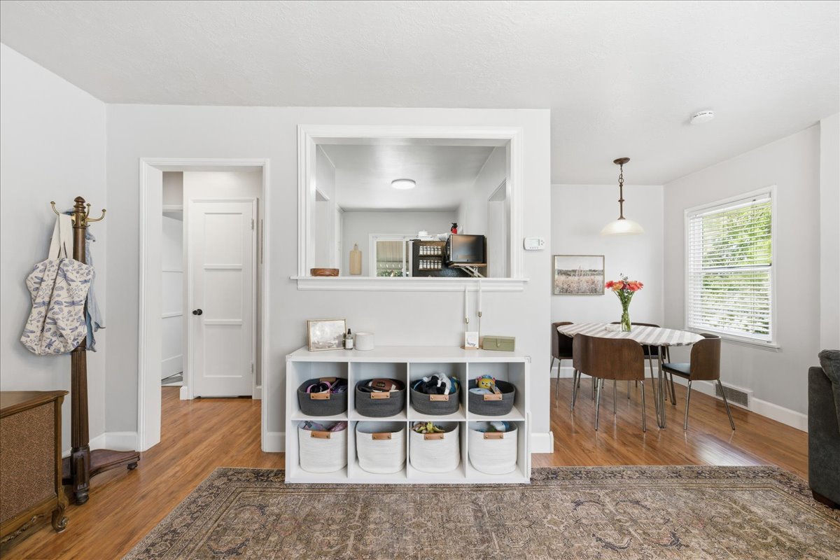Kitchen featuring dark wood finished floors and baseboards