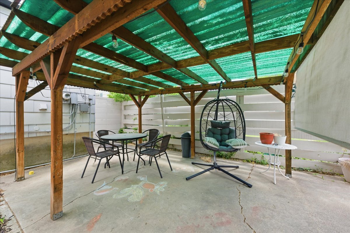 View of patio with outdoor dining space
