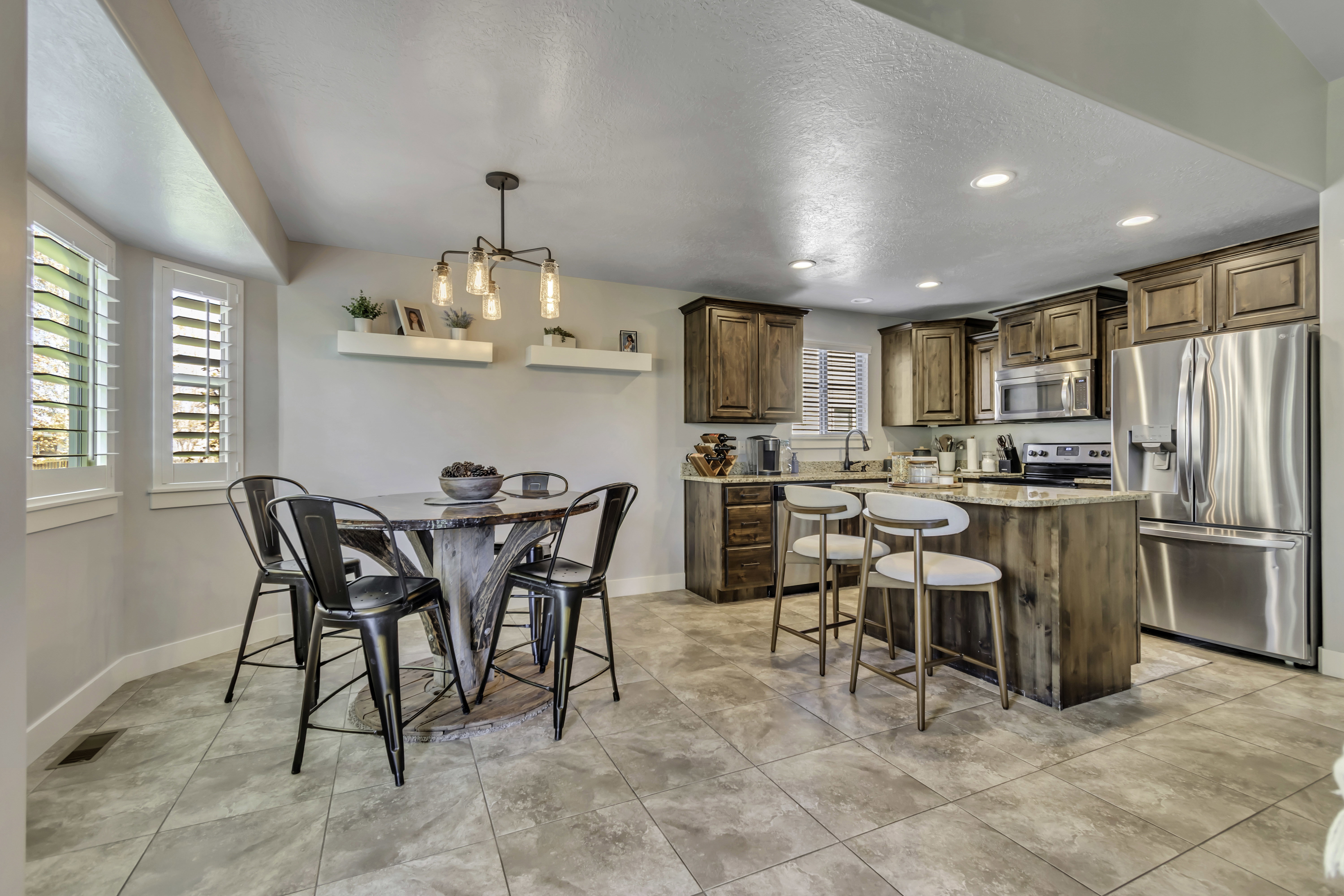 Dining space with recessed lighting and light tile patterned flooring
