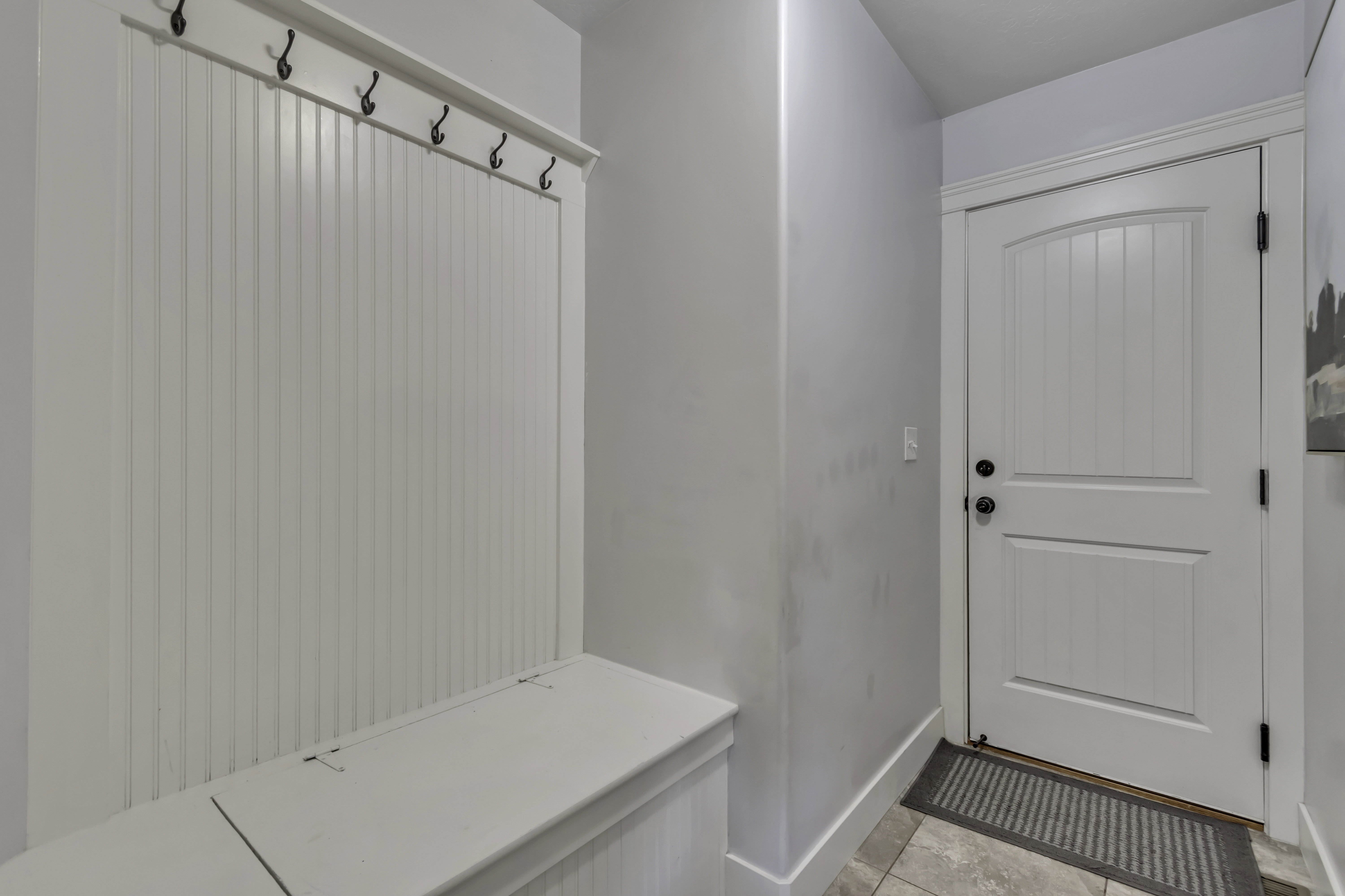 Mudroom featuring baseboards