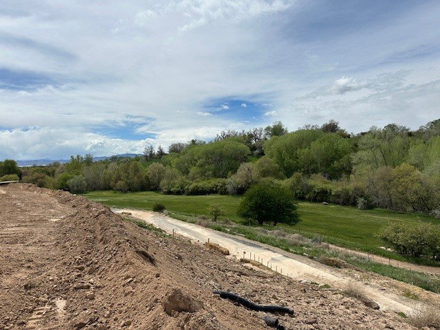 Expansive undeveloped lot with a natural soil surface