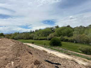 Expansive undeveloped lot with a natural soil surface