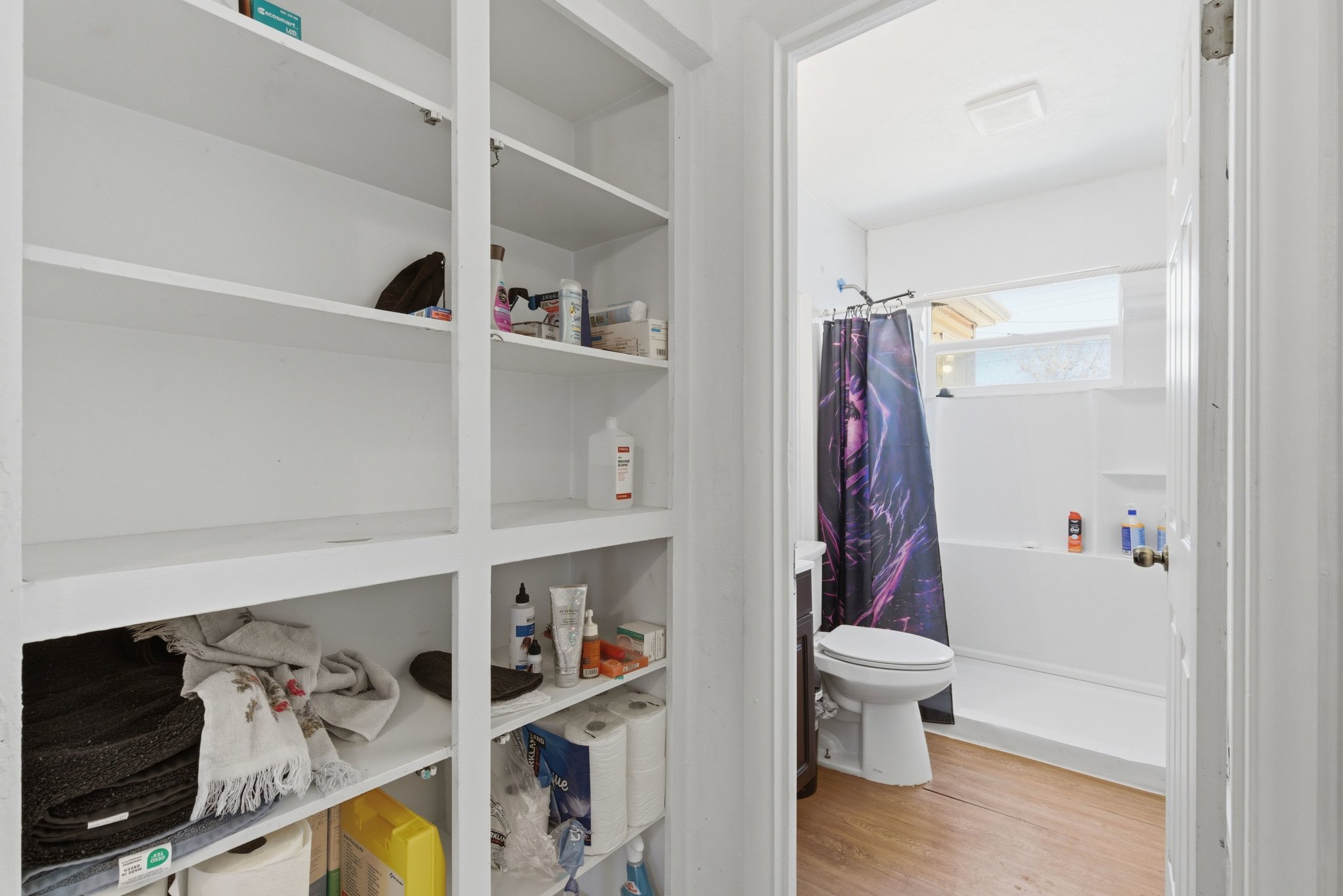 Integrated shelving unit with multiple open shelves