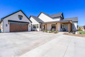 Modern farmhouse exterior with white board and batten siding