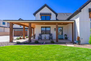 Modern farmhouse-style exterior with white board and batten siding