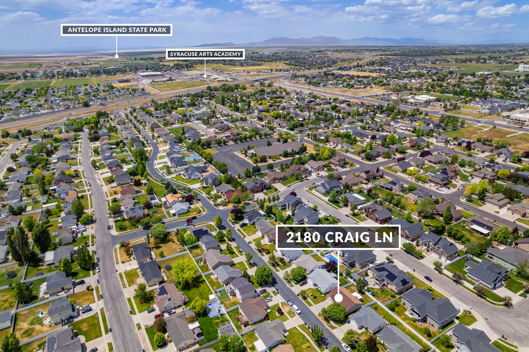 Aerial perspective of a developed residential neighborhood with a variety of single-family homes
