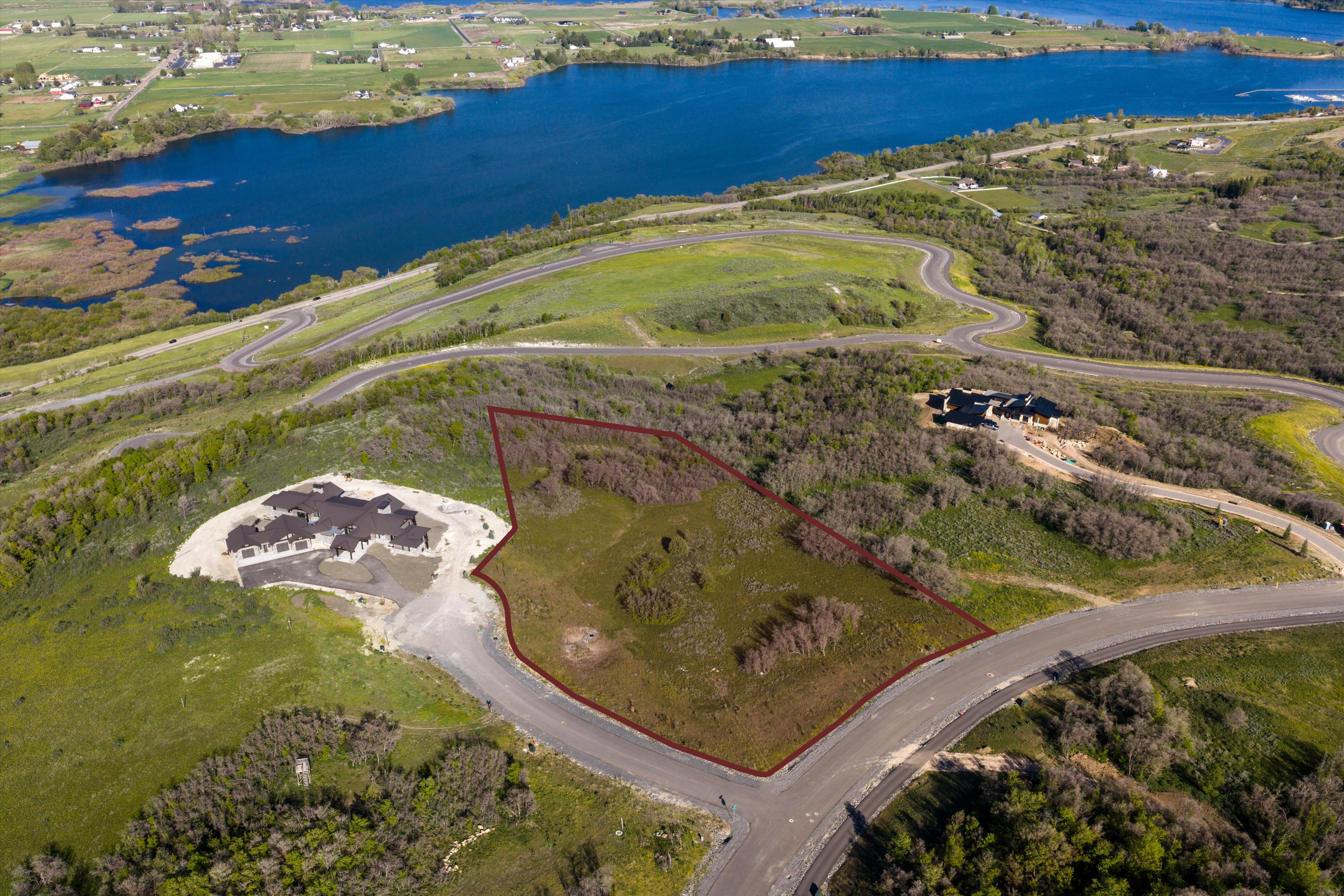 Expansive lot featuring a natural landscape and surrounding foliage