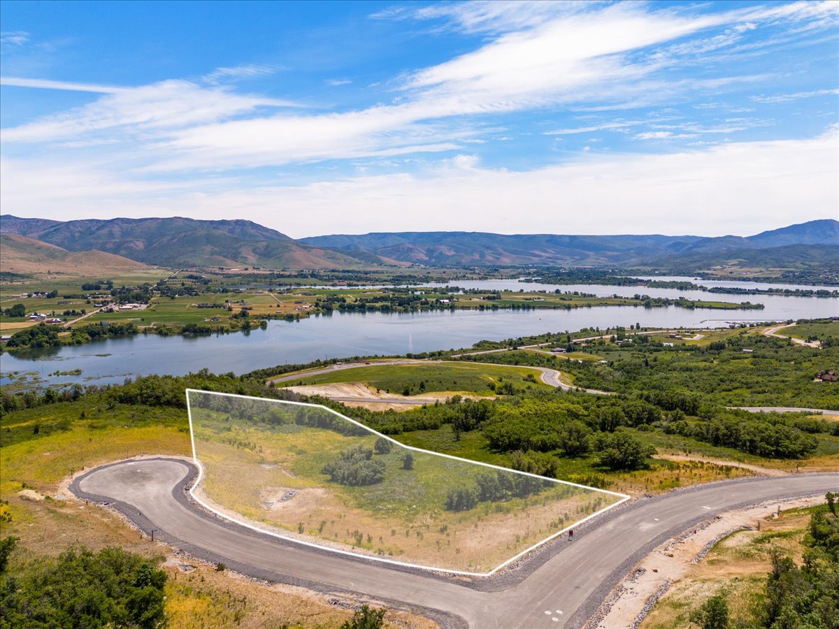 View of property location featuring property parcel outlined and a water and mountain view