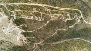 Aerial Photograph. Depicting the property from an overhead perspective, illustrating land use and topography