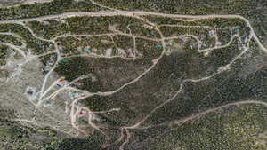 Aerial View. Displaying the property from an overhead perspective, including structures and surrounding topography