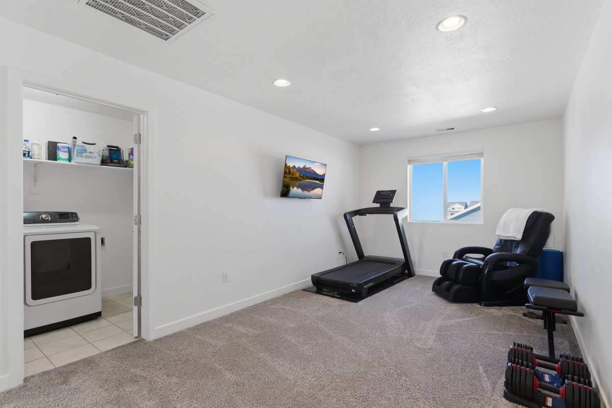Versatile room featuring recessed lighting, a window, and plush carpet flooring
