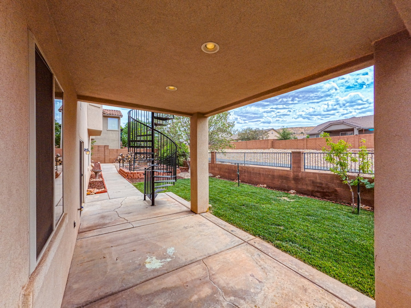 Covered patio featuring a concrete surface and recessed lighting