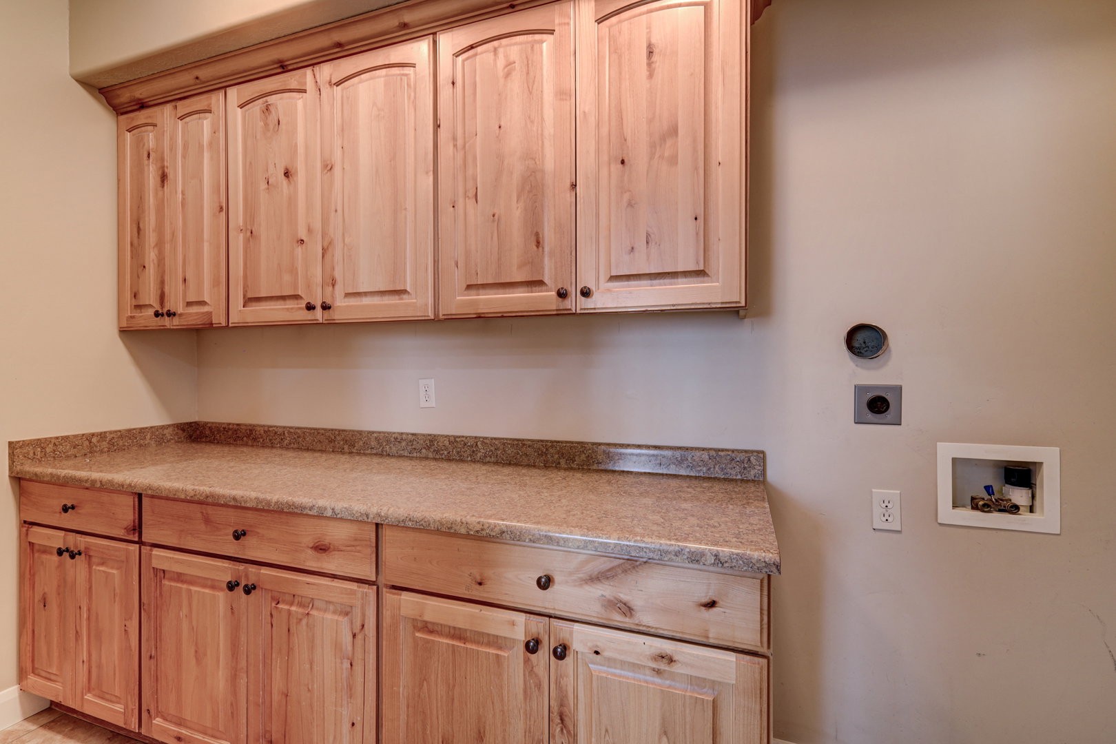 Extensive built-in cabinetry and countertop space provide ample storage
