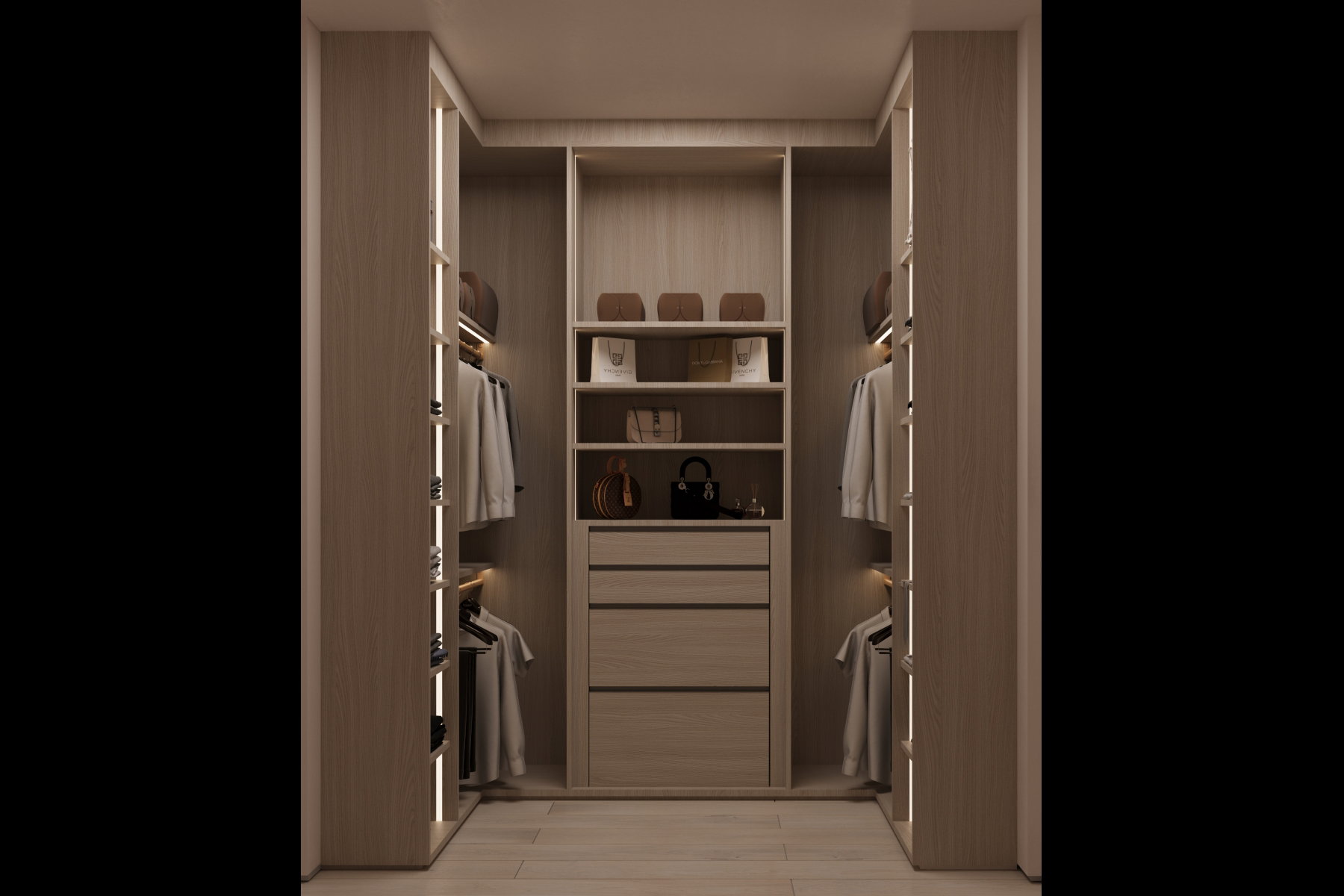Custom closet system featuring light wood-finish cabinetry, integrated strip lighting, multiple shelving units, and built-in drawers