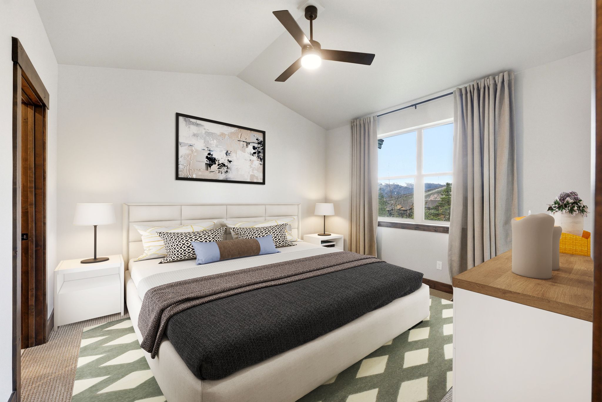 Vaulted ceiling featuring a ceiling fan with integrated lighting