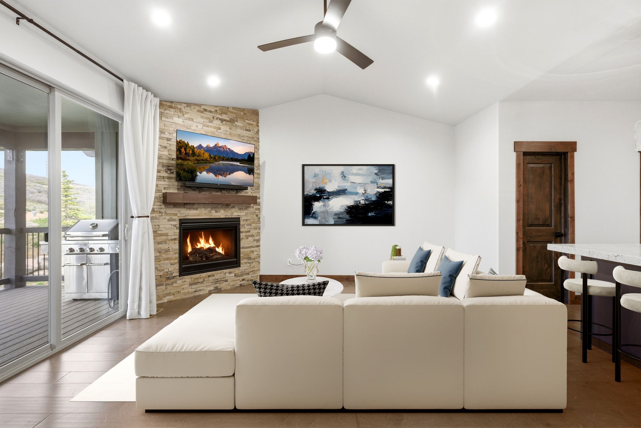 Vaulted ceilings featuring recessed lighting and a ceiling fan