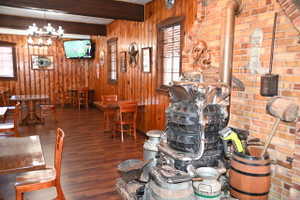 Warm interior space featuring extensive wood paneling