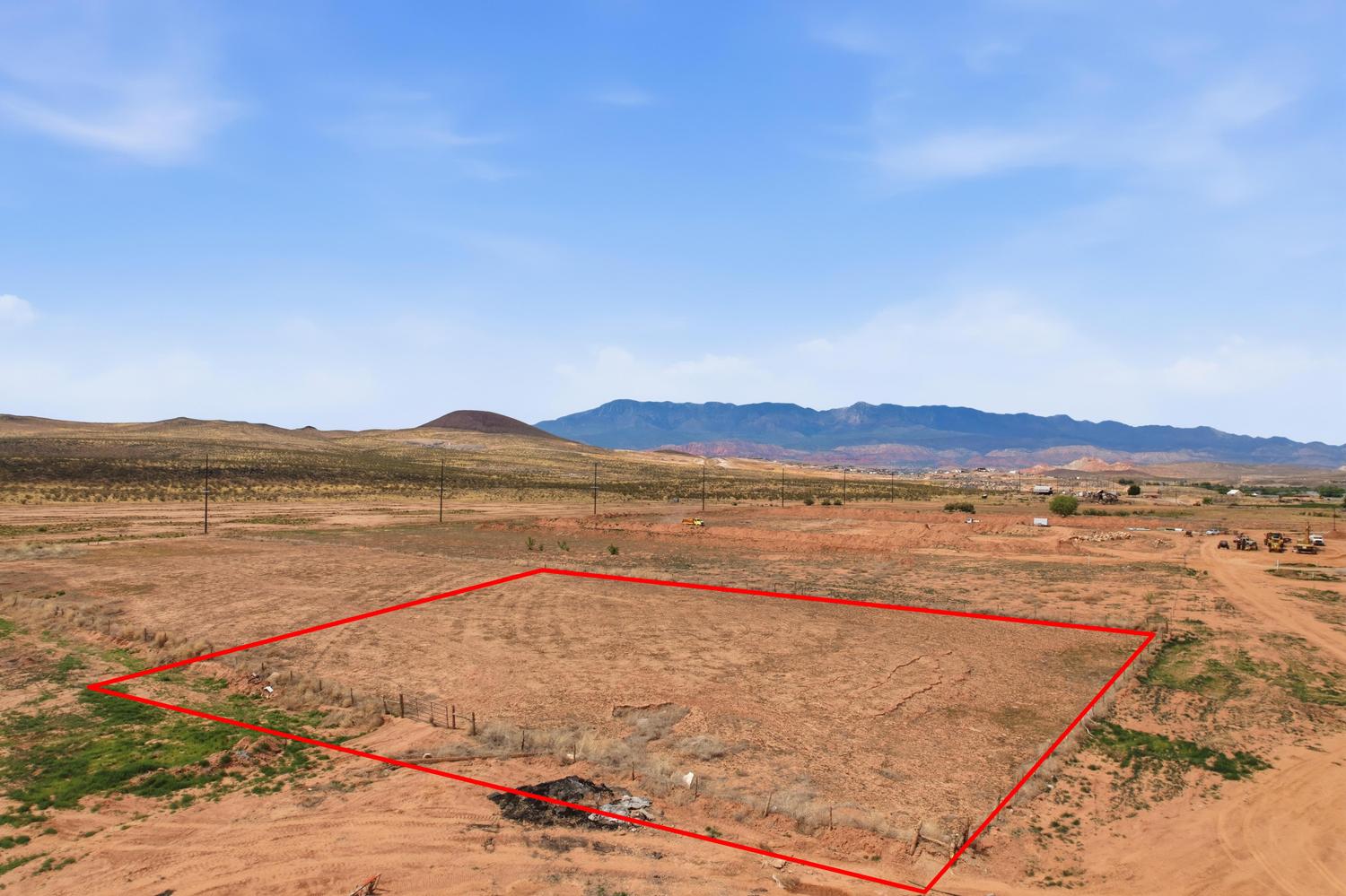 Expansive vacant land parcel featuring a natural desert landscape