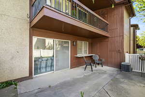 Ground-level patio with concrete flooring