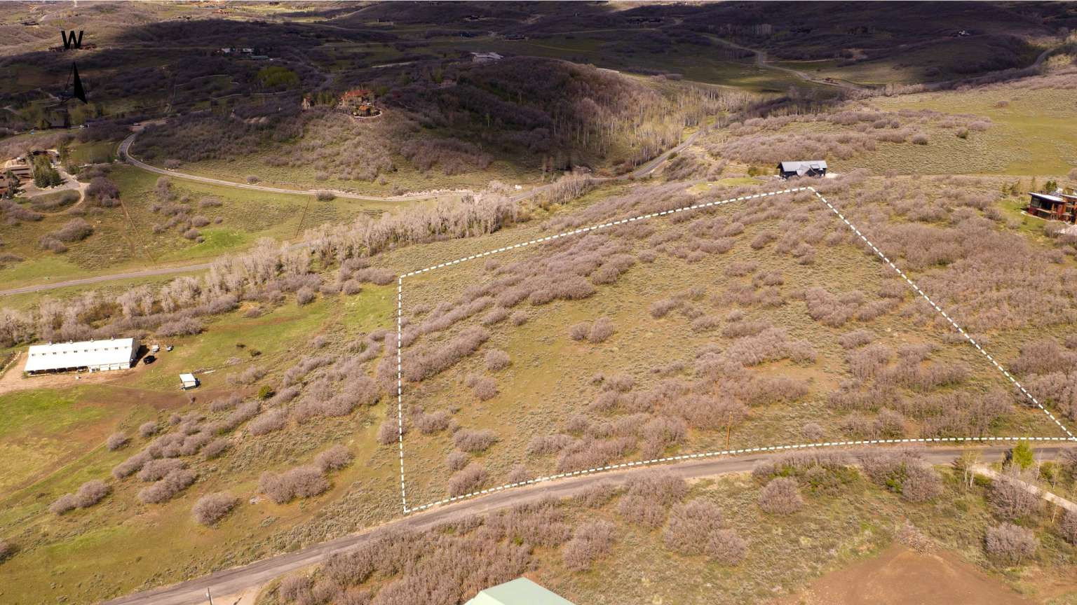 Expansive open parcel featuring natural brush and varied topography