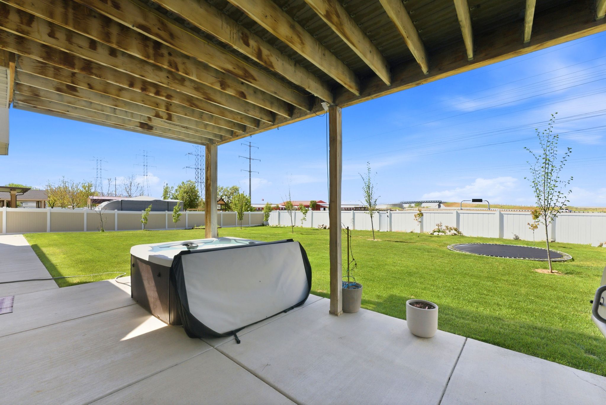 Fenced backyard featuring a patio area