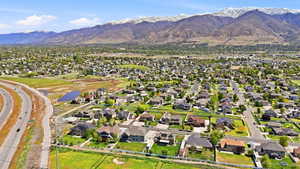 Aerial view of residential area featuring mountains