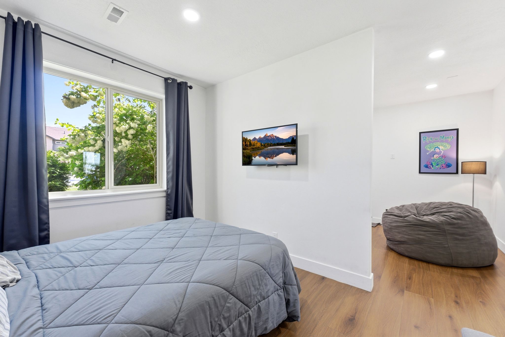 Bedroom featuring wood finished floors and recessed lighting