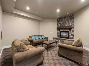 Built-in fireplace with stone surround and wood mantel