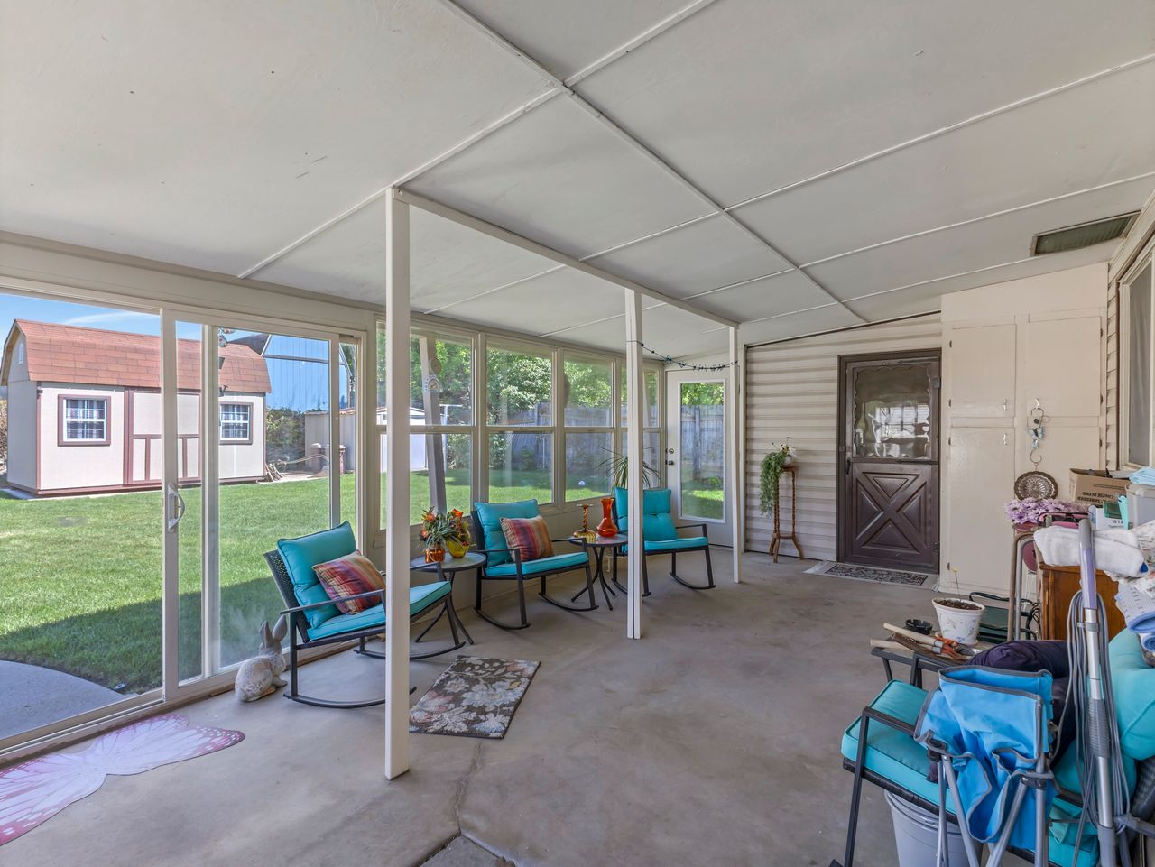 Screened patio with concrete flooring