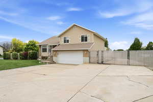 Front of home showing RV parking area