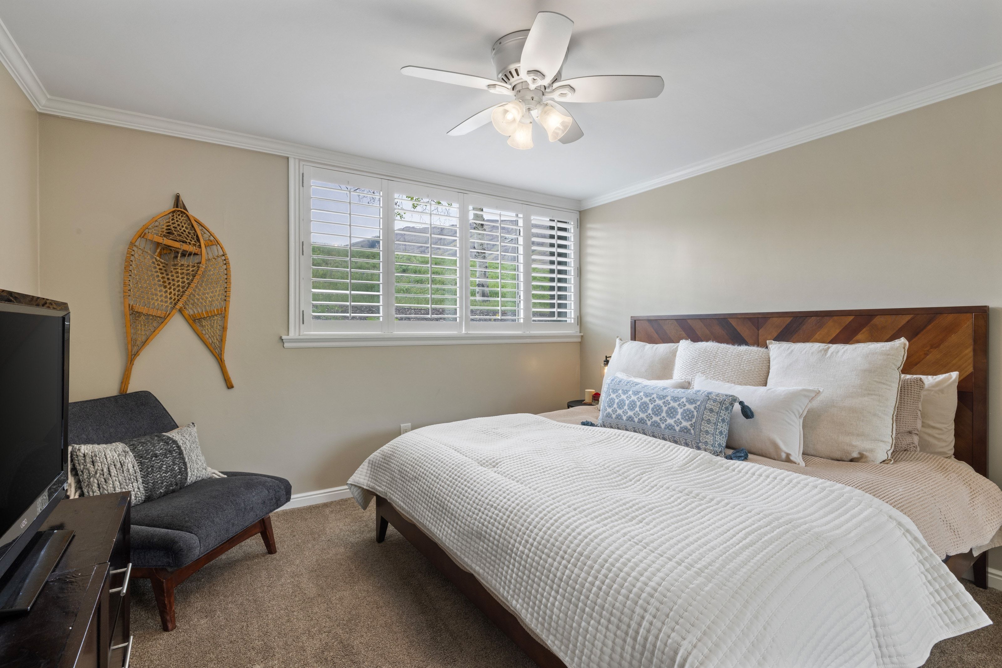 Neutral-toned walls with white crown molding