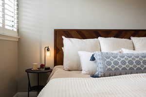 Custom wood headboard featuring a chevron pattern