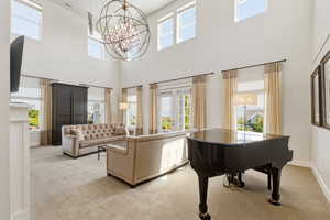 Soaring ceilings with upper transom windows