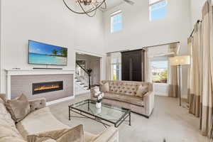 Soaring ceilings with upper windows provide abundant illumination